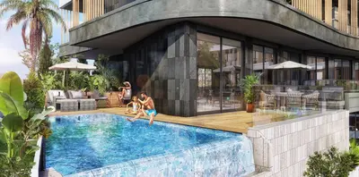 Luxury Swimming Pool and Outdoor Lounge Area. A vibrant outdoor pool area with an infinity-edge swimming pool, wooden deck, sun loungers, and lush tropical landscaping. This modern resort-style amenity offers relaxation for residents.