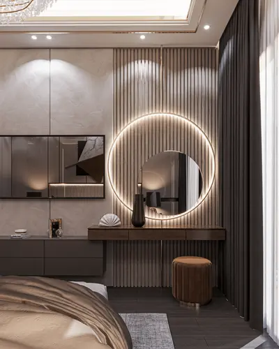 Luxurious Modern Bedroom with Elegant Dressing Table and Illuminated Mirror. A luxurious modern bedroom features dark wood flooring, a stylish dressing table with an illuminated circular mirror. Integrated ceiling lighting and sleek dark curtains create an elegant and sophisticated atmosphere.