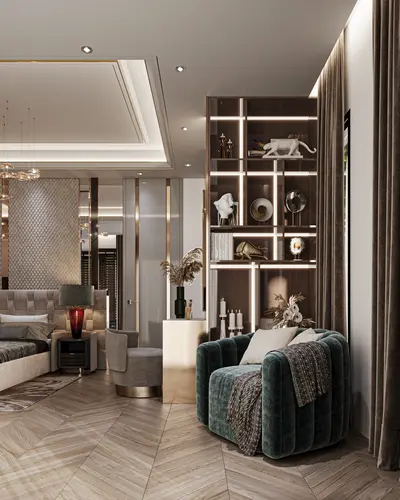 Luxurious Master Bedroom with Modern Design and Elegant Accents. A luxurious and modern master bedroom featuring chevron-patterned wood flooring, sophisticated ambient lighting, and elegant integrated shelves. A teal velvet armchair adds a pop of color.