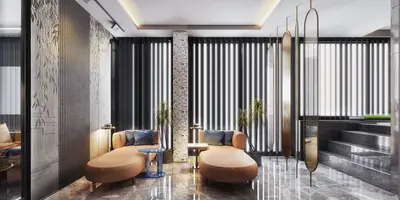 Modern Luxury Social Lounge with Elegant Design. A luxurious modern social lounge with two brown chaise lounges, polished marble flooring, and a textured feature wall. Large windows and decorative elements complete this chic relaxation space.