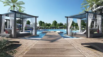 Luxury Resort-Style Swimming Pool with Private Cabanas. A modern, luxurious outdoor swimming pool area with a large blue pool, wooden deck, and two elegant cabanas featuring sun loungers and white curtains, surrounded by palm trees.