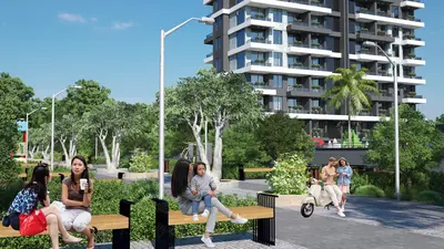 Modern Residential Building with Landscaped Social Areas. A vibrant outdoor social area featuring landscaped greenery, modern seating benches, and paved pathways, in front of a contemporary residential building.