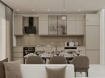 Sleek Modern Kitchen with Integrated Dining Area. A modern, open-plan kitchen and dining area featuring sleek beige cabinetry, marble-effect backsplash, integrated appliances, and a stylish dining table set for six. Contemporary design with accent lighting.