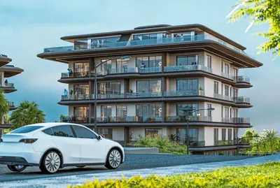 Modern Luxury Apartment Building with Expansive Balconies and Terraces. Exterior view of a modern luxury apartment building, multi-story with extensive glass-railed balconies and terraces. Features lush greenery, large windows, and a sleek design, suitable for high-end living.