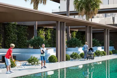 Luxury Poolside Social Area with Lush Greenery. Modern outdoor social area with a clear swimming pool, lush greenery, and palm trees. Features a covered walkway and family activities, emphasizing a well-maintained, luxurious communal space.