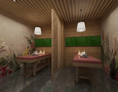 Luxurious Spa Treatment Room with Tropical Decor. A tranquil spa treatment room featuring two massage tables with towels and candles. The modern space has a slatted wood ceiling, dark marble flooring, green wall accents, and tropical floral murals, creating a relaxing ambiance.