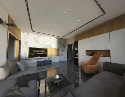Contemporary Living Room with Elegant Marble Wall and Dark Floors. A modern living room with sleek dark tile flooring, a marble feature wall with TV, comfortable grey sectional sofa, and a stylish brown armchair. Well-lit with contemporary lighting.