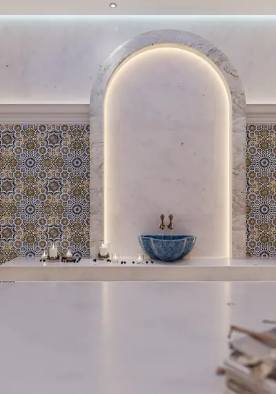 Luxurious Turkish Bathroom with Ornate Basin and Mosaic Walls. A luxurious, modern spa-style bathroom featuring a distinctive blue clover-shaped basin with ornate brass taps. White marble surfaces complement the geometric patterned mosaic tiles and an illuminated arched niche.