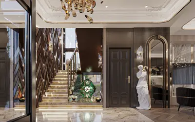 Luxury Entrance Lobby with Illuminated Marble Staircase. Luxurious modern entrance hall with polished marble flooring and a grand illuminated staircase. Features include a chic chandelier, decorative wall paneling, and high-end finishes, exuding opulence.