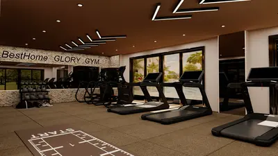 Modern Residential Gym with State-of-the-Art Equipment. A modern, well-equipped residential gym featuring multiple treadmills, various strength training equipment including kettlebells, and mirrored walls. It has large windows, stylish linear lighting, and durable rubber flooring.