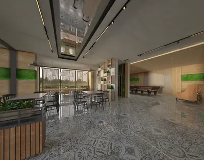 Spacious Modern Social Area with Billiards and Cafe Seating. A spacious, modern communal social area with patterned tiled flooring. Features include cafe-style seating, a billiard table, and stylish wood paneling with green accents, all well-lit.
