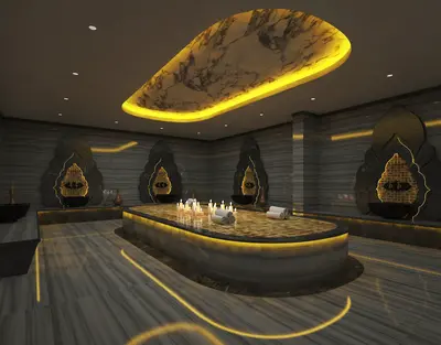 Luxurious Hammam Spa with Modern Marble Design. A luxurious and modern hammam spa room featuring polished marble floors, walls, and a central heated slab. Ambient yellow lighting, decorative washing stations, and candles create a serene relaxation space.