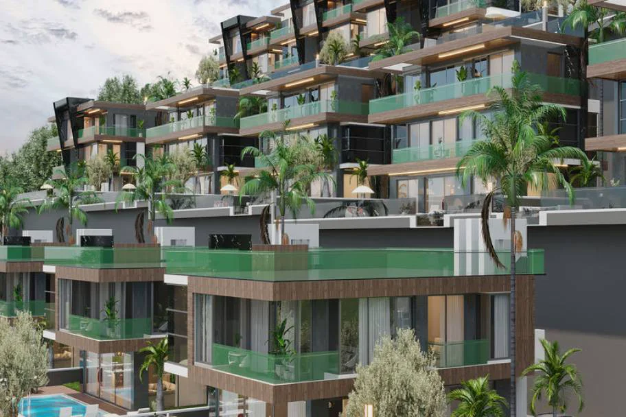 Luksuriøse moderne terrasselejligheder med grønne altaner. Udvendig visning af et moderne, luksuriøst terrasselejlighedskompleks med grønne altaner i flere niveauer, palmer og en swimmingpool, der fremviser moderne design og frodig landskabspleje.