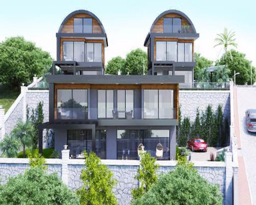 Moderne nutidige tvillingevillaer med terrasser og haver. Udvendig visning af to moderne etagevillaer med store glasvinduer og private terrasser. Indeholder moderne arkitektur, frodig grøn landskabspleje, støttemure af sten og en indkørsel.