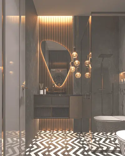 Luxurious Modern Bathroom with Unique Lighting and Vanity. A luxurious modern bathroom featuring a unique backlit mirror over a sleek vanity, elegant globe pendant lights, and striking black and white geometric floor tiles. A shower and washing machine are also visible.