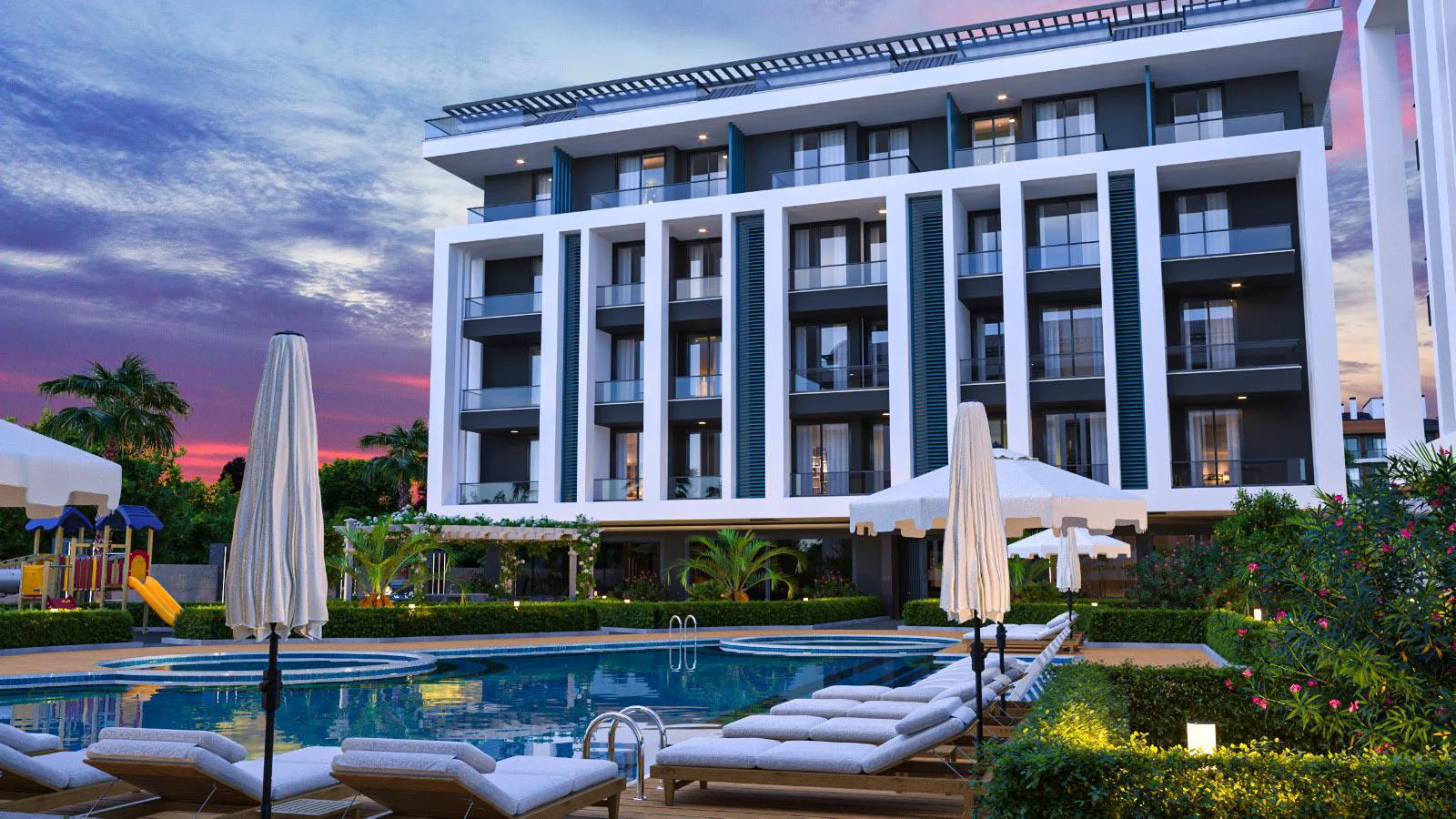 Modern Residential Complex Pool and Garden Area. Exterior view of a modern apartment building at dusk. Features a large swimming pool with sun loungers, umbrellas, and lush landscaped gardens, including a playground.