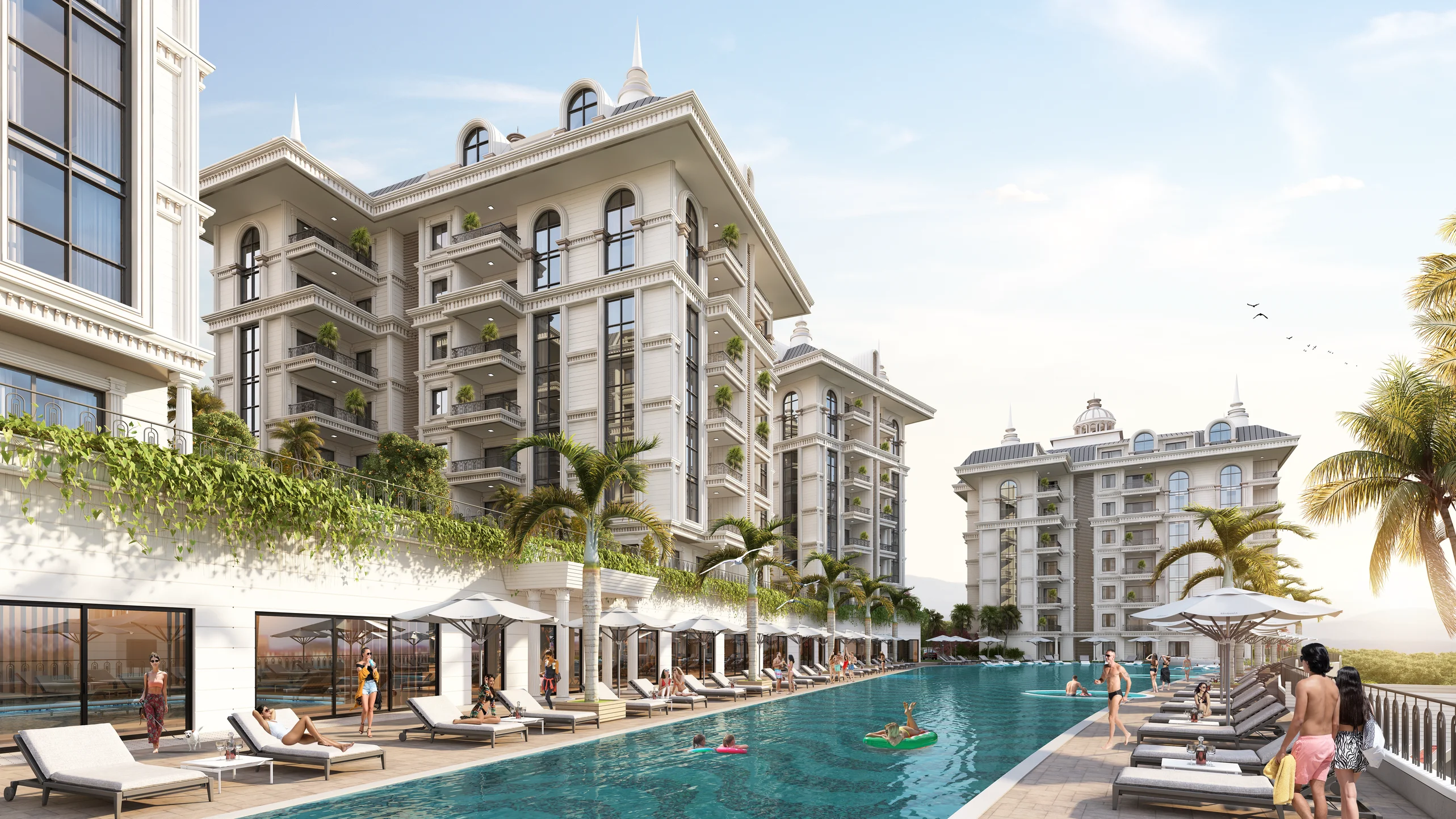 Luxury Apartment Complex with Resort-Style Outdoor Pool. Exterior of a luxurious residential complex. Features a large outdoor swimming pool with sun loungers and umbrellas, surrounded by palm trees and elegant buildings, offering a resort-like experience.